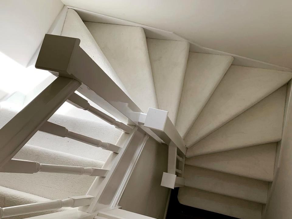 Cream carpet on a turning staircase
