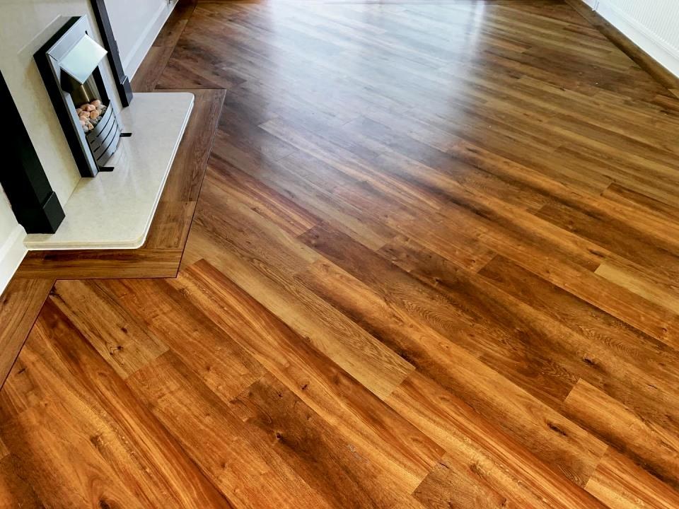 Wood-effect flooring fitted in a living room